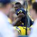 Michigan wide receiver Devin Gardner smiles as he sits on the bench in the fourth quarter at Michigan Stadium on Saturday. Melanie Maxwell I AnnArbor.com